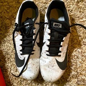 Youth Nike track shoes with extra spikes.